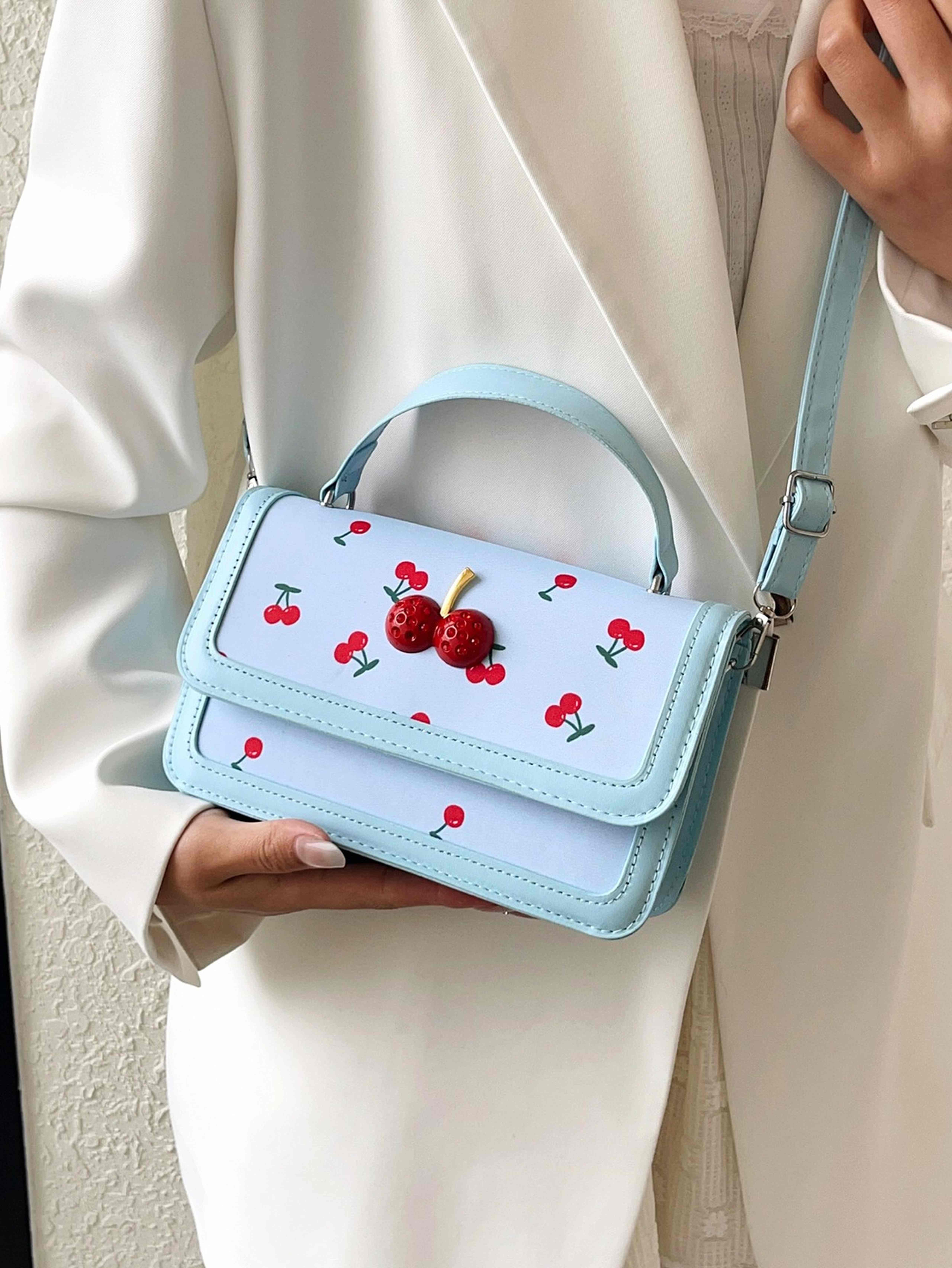 Light Blue Crossbody Bag with Button Closure