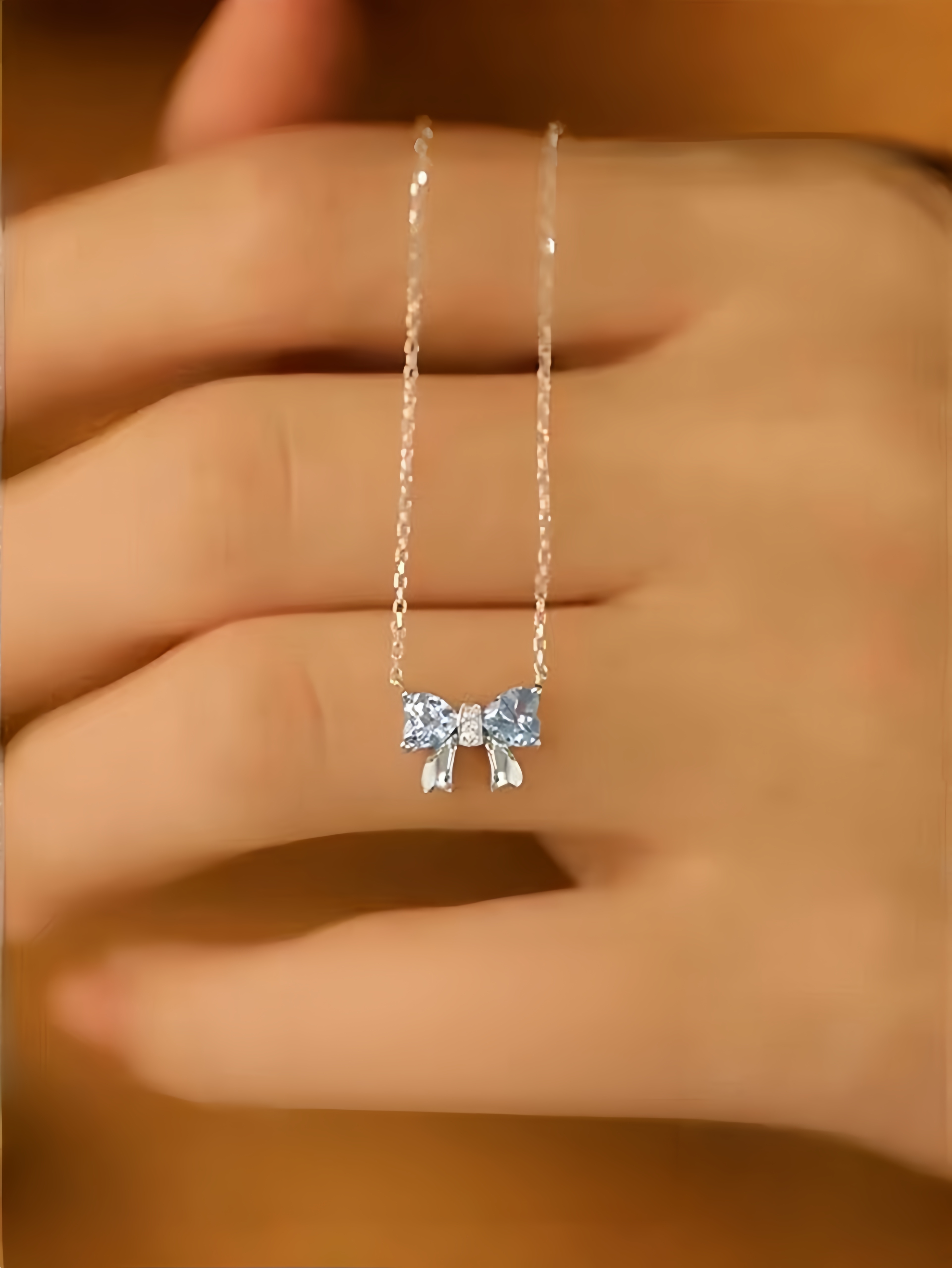 Silver Bow Pendant Necklace