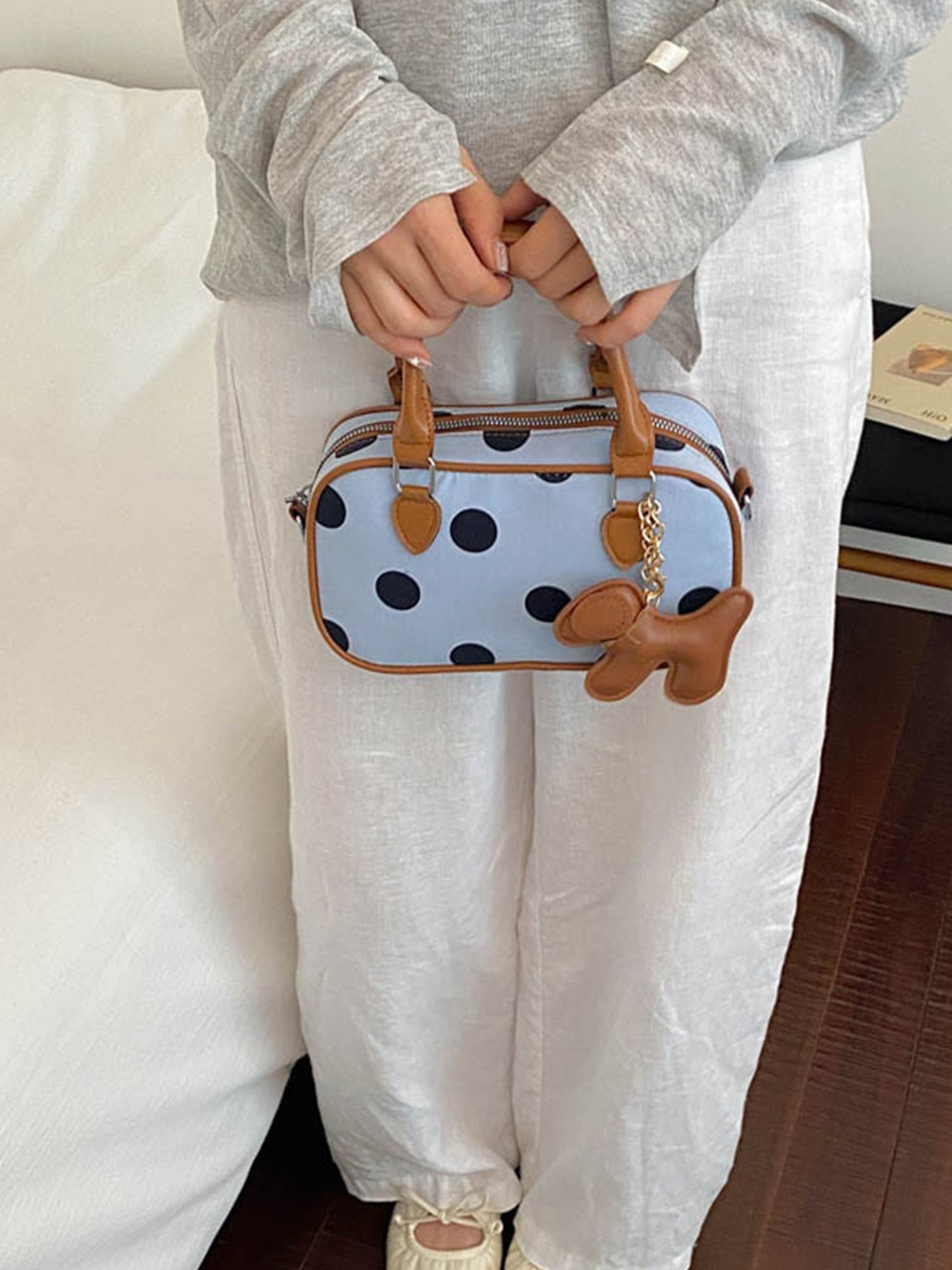 Light Blue Handbag with Zip Closure