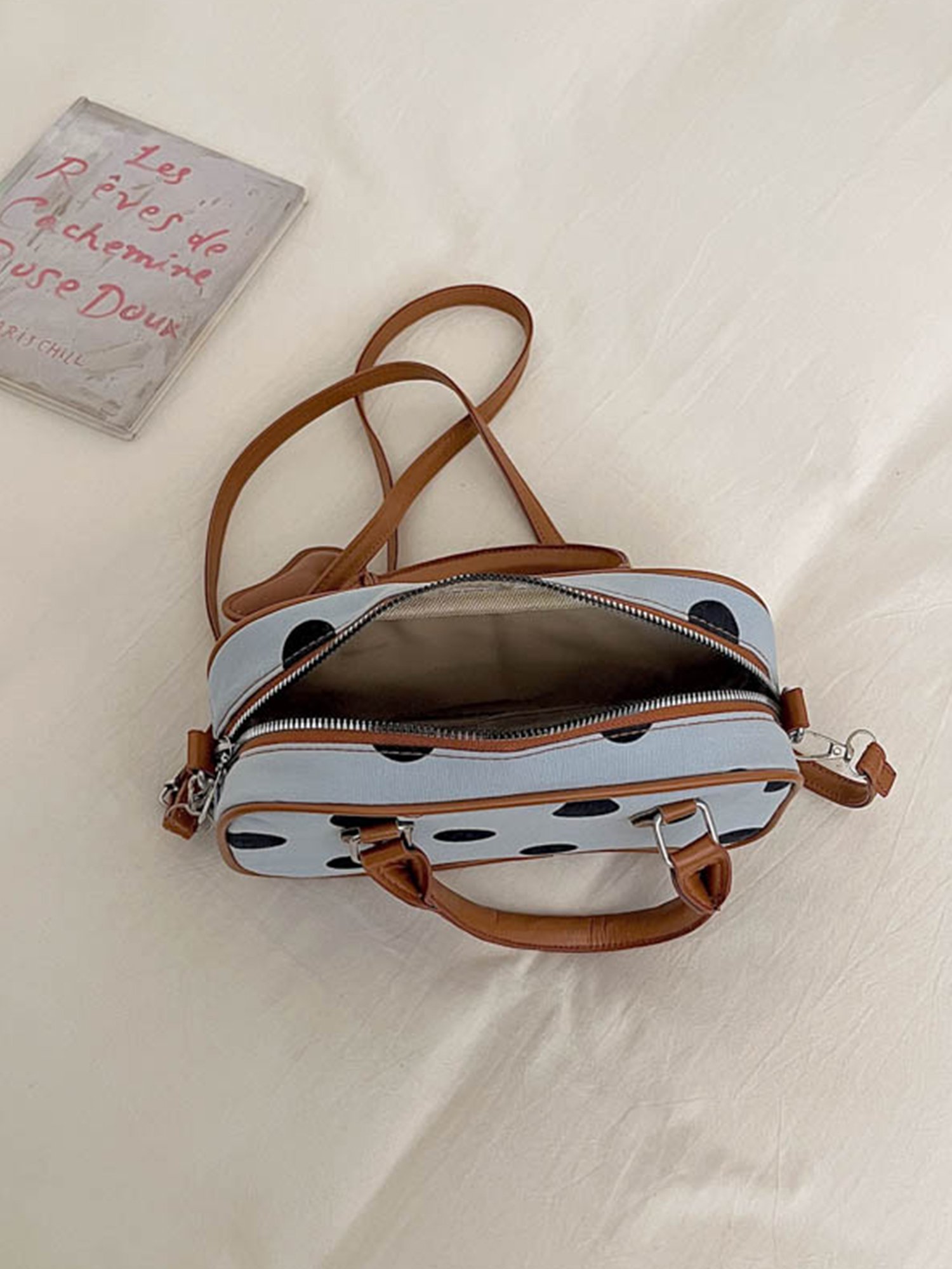 Light Blue Handbag with Zip Closure