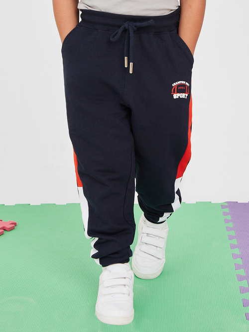 Blue joggers white stripe clearance