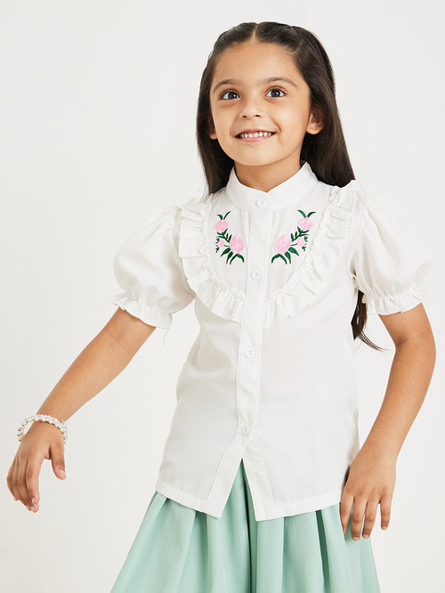 Embroidered ruffle skirt top