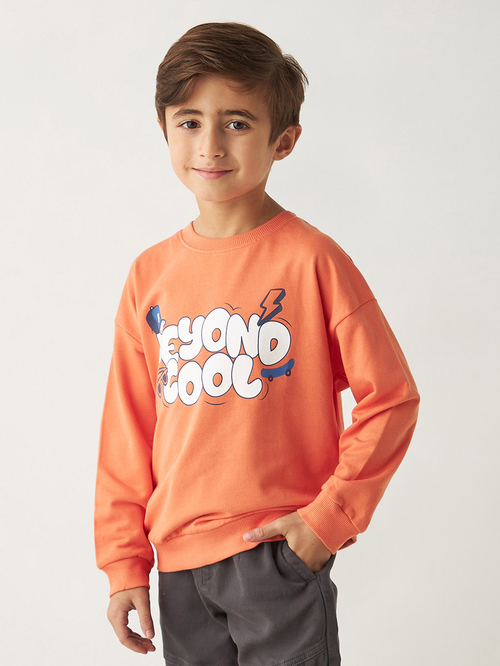 Buy Beyond Cool Graphic Sweatshirt Orange For Kids Styli UAE