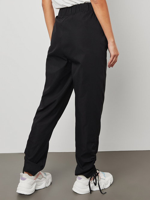 Buy Plain Jogger Pants Adjustable String On Cuff Black For Women Styli Saudi