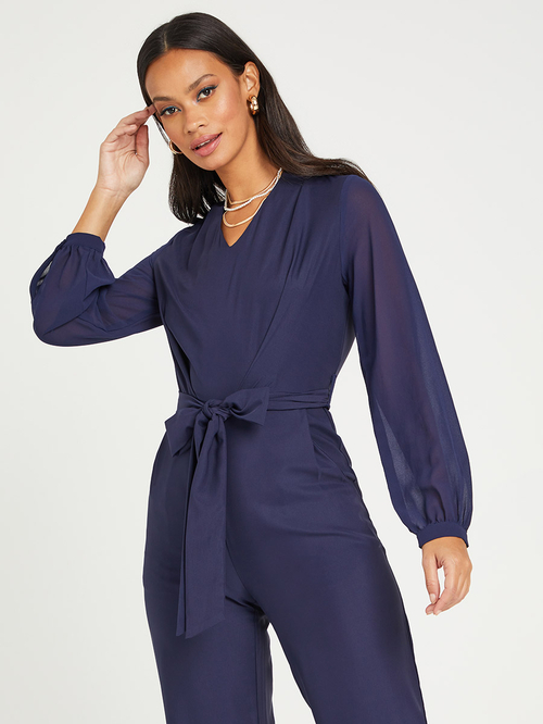 Buy Long Sleeves Wide Leg Jumpsuit with Tie Belt Navy Blue For Women Styli UAE