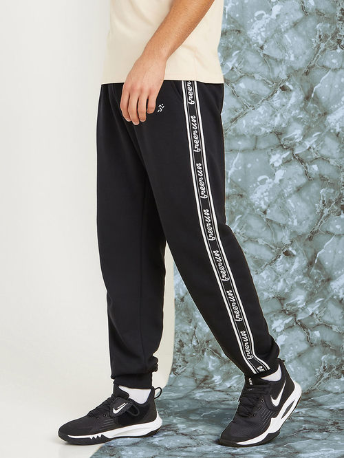 Buy Side Tape Detail Track Pants Black For Men Styli Saudi