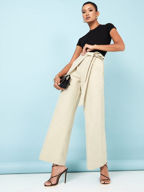 Buy Self Tie Wrap Look Detail Wide Leg Pants Beige For Women | Styli Saudi