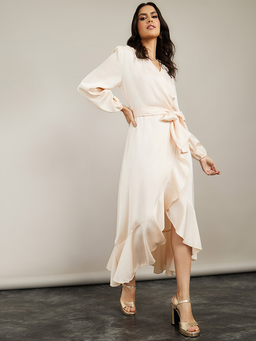 Buy Long Sleeves V Neck Wrap Maxi Dress with Ruffle Detail Cream For Women Styli Kuwait