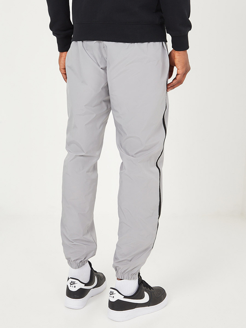 Buy Woven Track Pants with Contrast Side Tape Detail and Reflective Logo Grey For Men Styli Kuwait