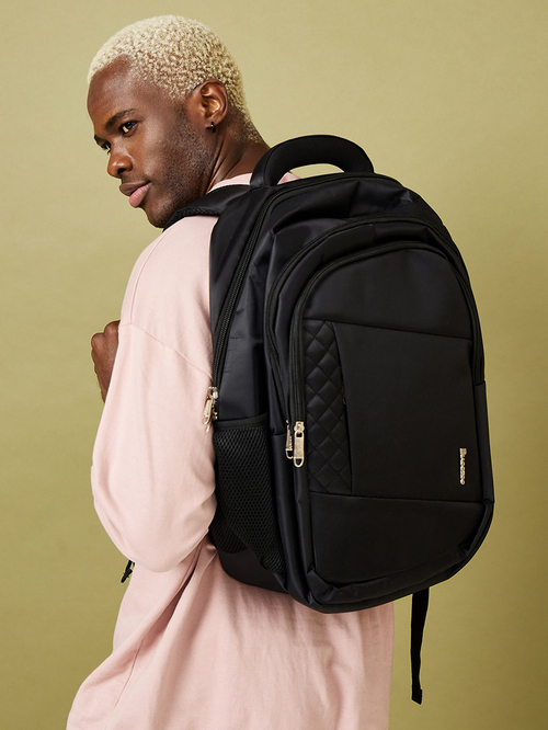 Backpack with zippered side pockets top