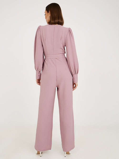 Buy Long Sleeves Textured Wide Leg Jumpsuit with Self Tie Light Pink For Women Styli Saudi