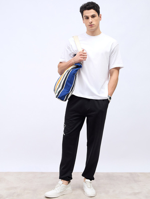 Buy Slogan Print Oversized Jogger with Slip Pocket Black For Men Styli Saudi