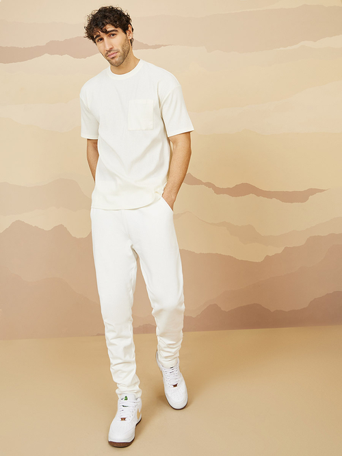 Buy Straight Fit Open Hem Jogger Cream For Men Styli UAE