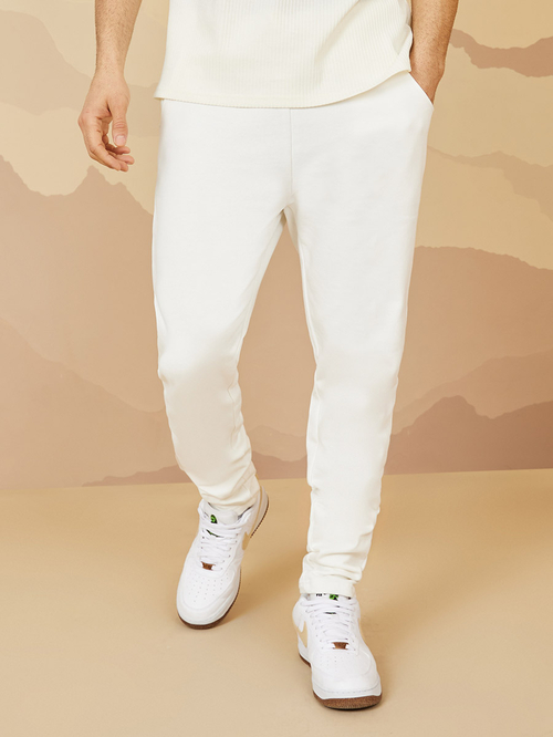 Buy Straight Fit Open Hem Jogger Cream For Men Styli UAE