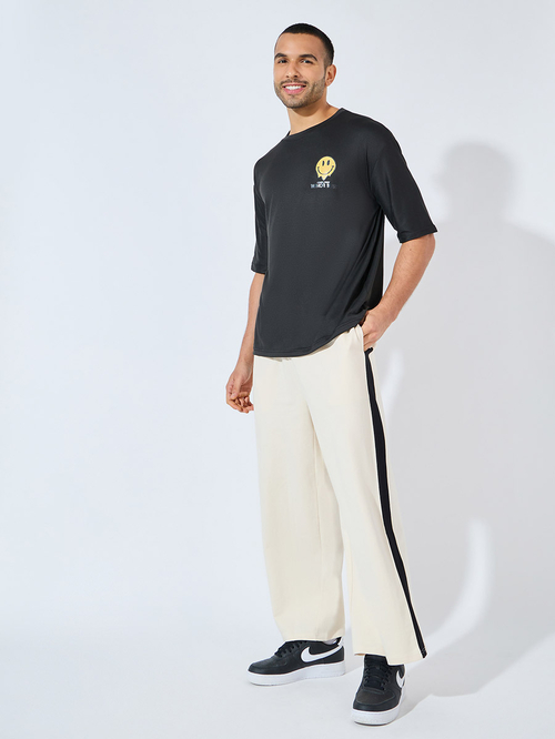 Buy Extra Wide Leg Joggers with Contrast Stripe Detail Cream For Men Styli Saudi