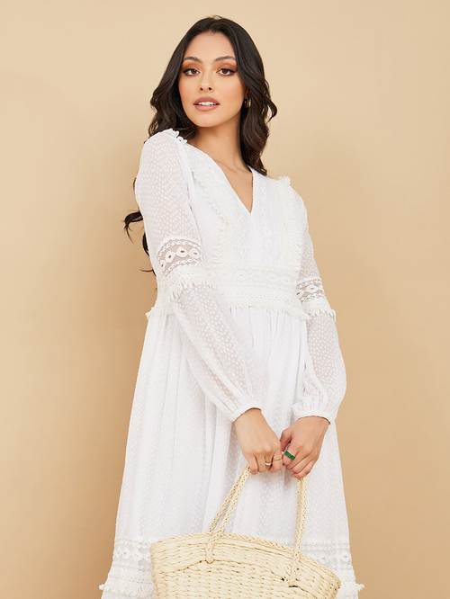 Buy Dobby Lace Tassel Detail Tiered Maxi Dress White For Women Styli Saudi