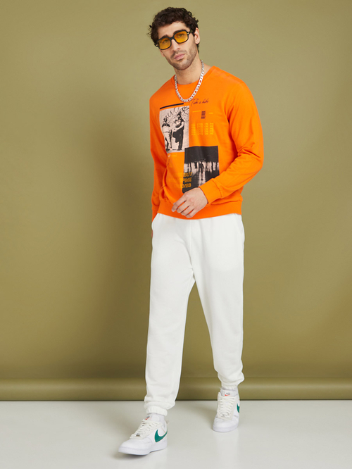 Buy Solid Oversized Fit Elastic Cuff Joggers Cream For Men Styli Saudi
