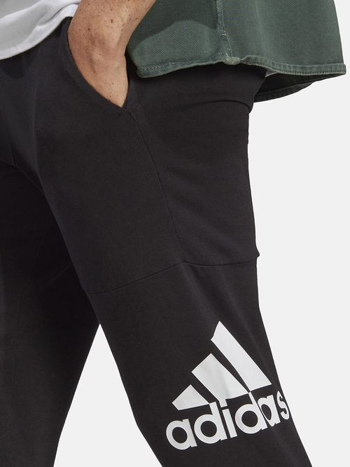 Buy Essentials Single Jersey Tapered Badge of Sport Joggers Black For Men Styli UAE