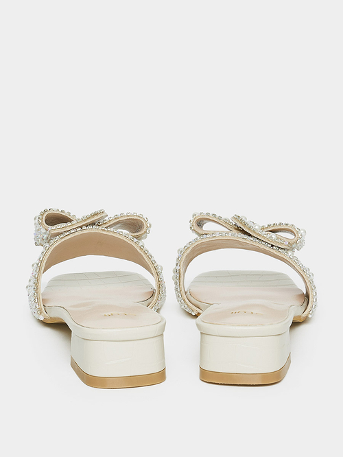 Buy Embellished Bow Low Heel Sandals Silver For Women Styli UAE