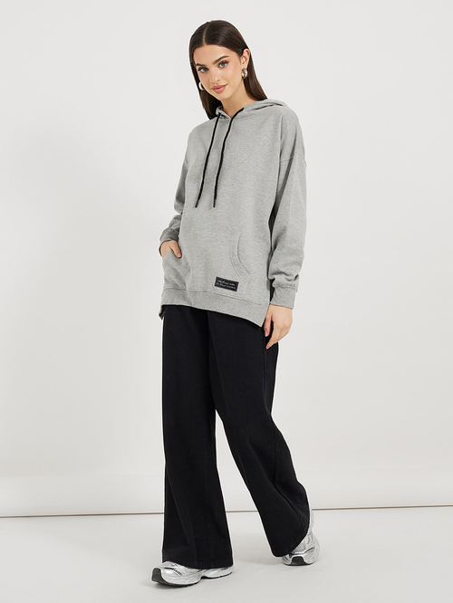 Buy Oversized Longline Hoodie with Badge Side Slits Grey For Women Styli UAE