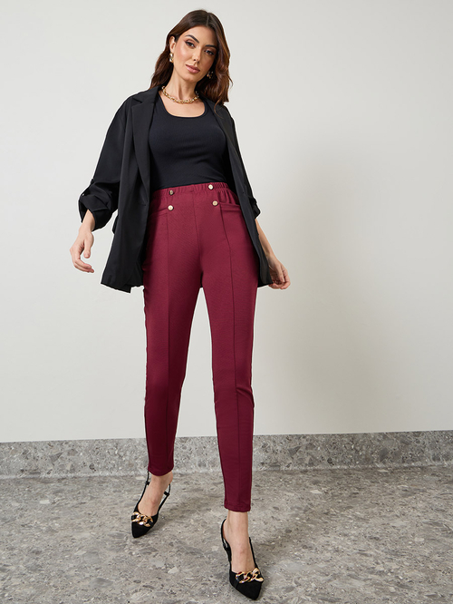 Buy Button Pocket Detail Ankle Length Treggings Burgundy For Women Styli UAE