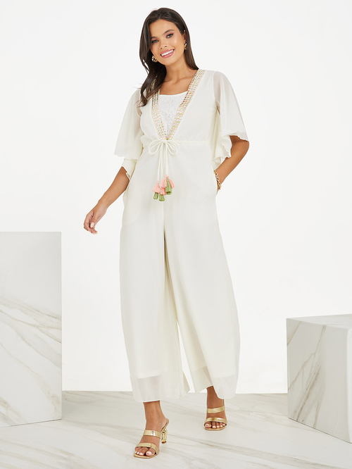 Buy Batwing Sleeve Wide Leg Jumpsuit with Tassel Detail Off White For Women Styli UAE