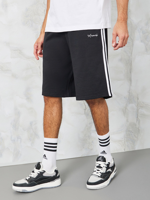Buy Side Tape Mock Snap Button Oversized Fleece Shorts Black For Men Styli UAE