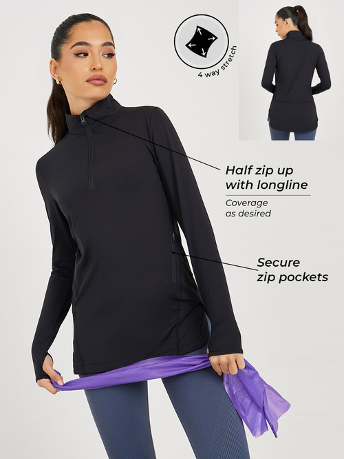 Buy Half Zip Up Side Slit Curved Hem Thumbhole Detail Longline Top Black For Women Styli Saudi