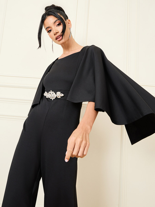 Buy Embellished Waistband Detail Cape Sleeves Jumpsuit Black For Women Styli Saudi