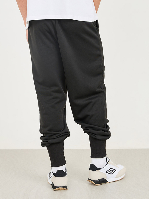 Buy Badge Detail Extra Wide Rib Cuff Low Rise Joggers Black For Men Styli Saudi