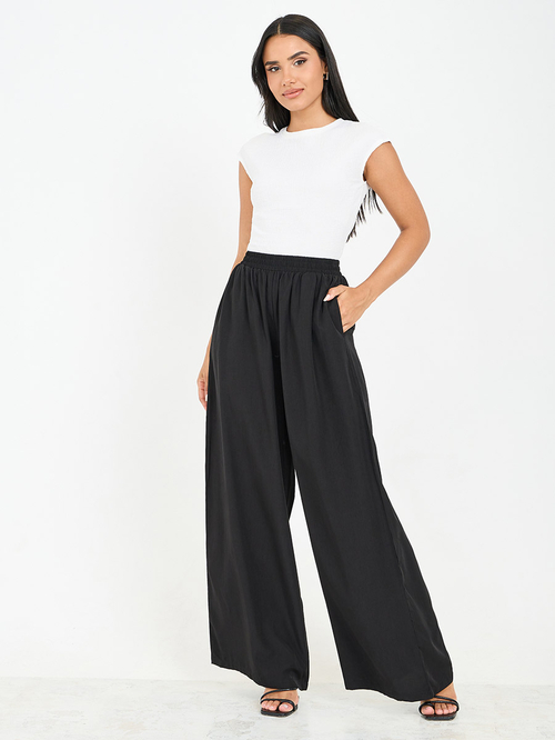 Buy Solid High Rise Wide Leg Pants Black For Women Styli UAE