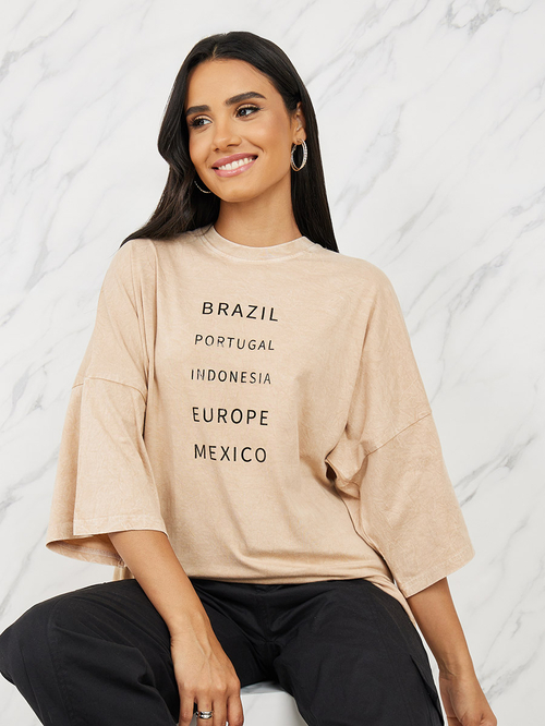 Buy Oversized Acid Wash Drop Shoulder Longline T Shirt Orange For Women Styli UAE
