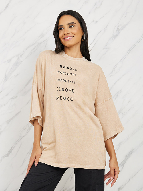 Buy Oversized Acid Wash Drop Shoulder Longline T Shirt Orange For Women Styli UAE