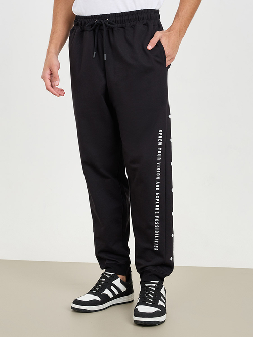 Buy Oversized Side Vertical Print and Popper Detail Joggers Black For Men Styli Saudi