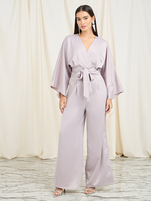 Buy Satin Wide Leg Self Tie Up Jumpsuit Beige For Women Styli Saudi