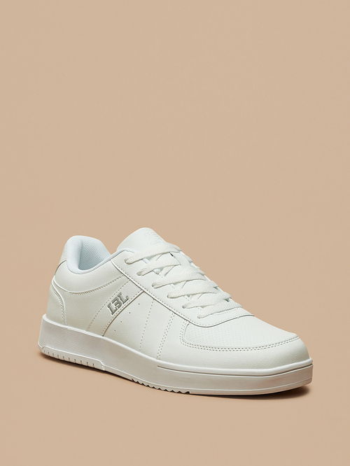 Buy Textured Low Ankle Lace Up Sneakers White For Men Styli UAE
