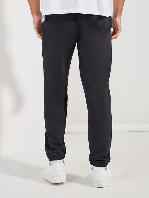 Buy Jurassic Park Graphic Print Oversized Terry Joggers Black For Men Styli UAE