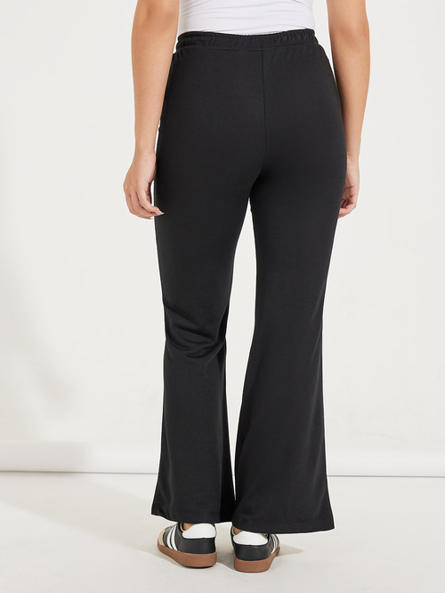 Buy Solid Flared Joggers with Drawstrings Black For Women Styli UAE