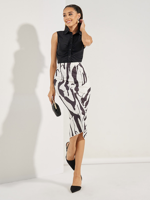 Buy Knitted Abstract Print Fit Flare Midi Skirt Black For Women Styli Saudi