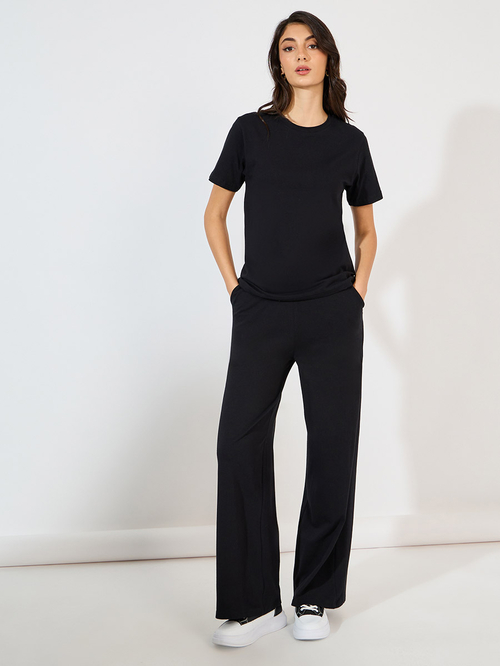 Buy Short Sleeve Crew Neck T Shirt And Wide Leg Joggers Co Ord Set Black For Women Styli Saudi