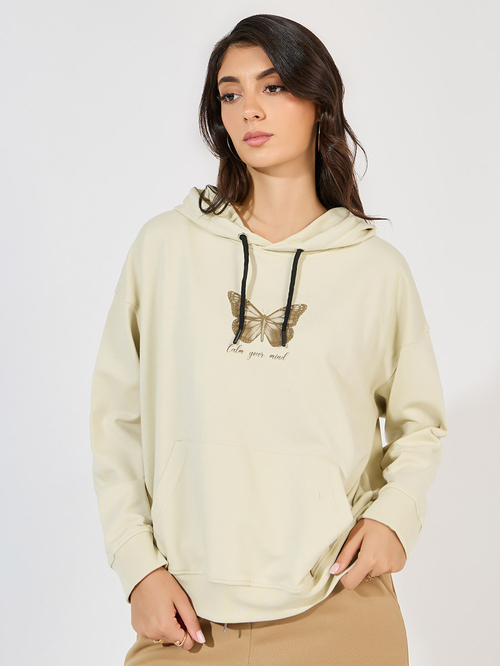 Buy Oversized Regular Length Graphic Hoodie Beige For Women Styli Saudi
