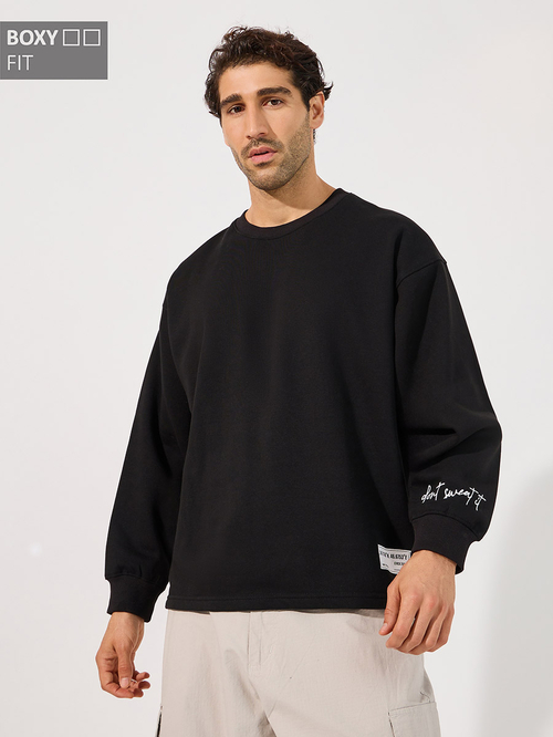 Buy Slogan Print Longline Boxy Sweatshirt with Slide Slit Black For Men Styli Kuwait