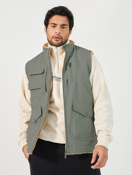 Buy Warm Fleece Lined Gilet Jacket with Zip Detail Olive For Men Styli Bahrain