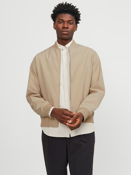 Buy Solid Bomber Jacket with Ribbed Cuff Cream For Men Styli Kuwait