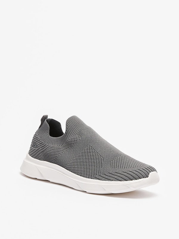 Buy Textured Slip On Sports Shoes with Pull Tabs Grey For Kids Styli Saudi