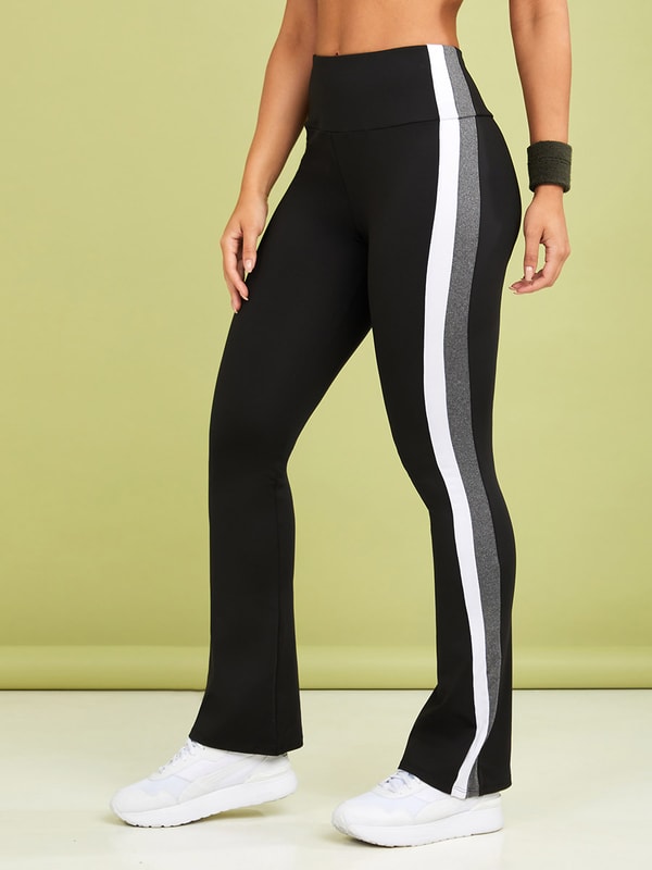 Buy Contrast Trim Detail Sports Bra and Side Stripe Flare Leggings Active Set Black For Women Styli Saudi