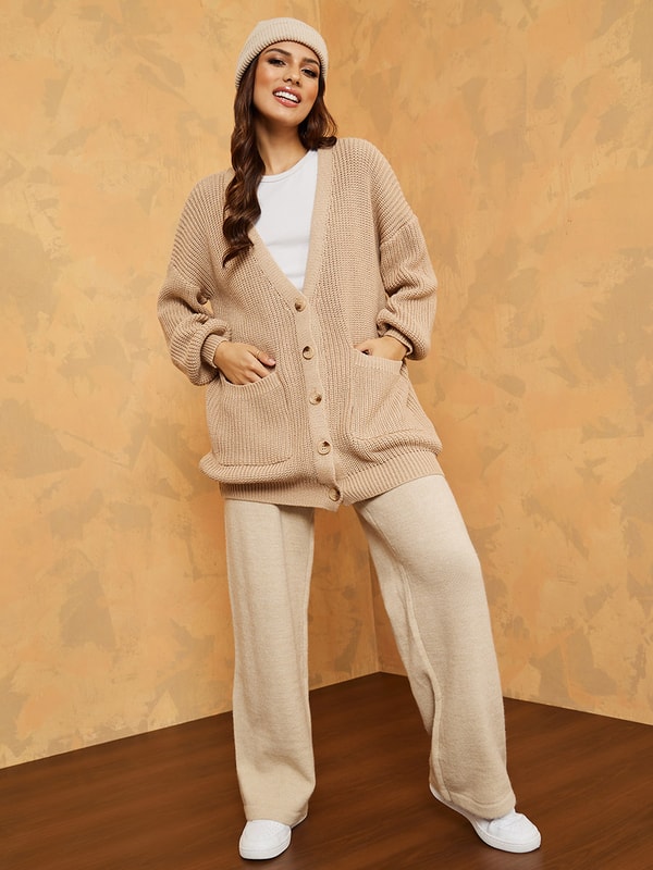Buy Longline Chunky Knit Oversized Cardigan with Buttons Beige For Women Styli UAE