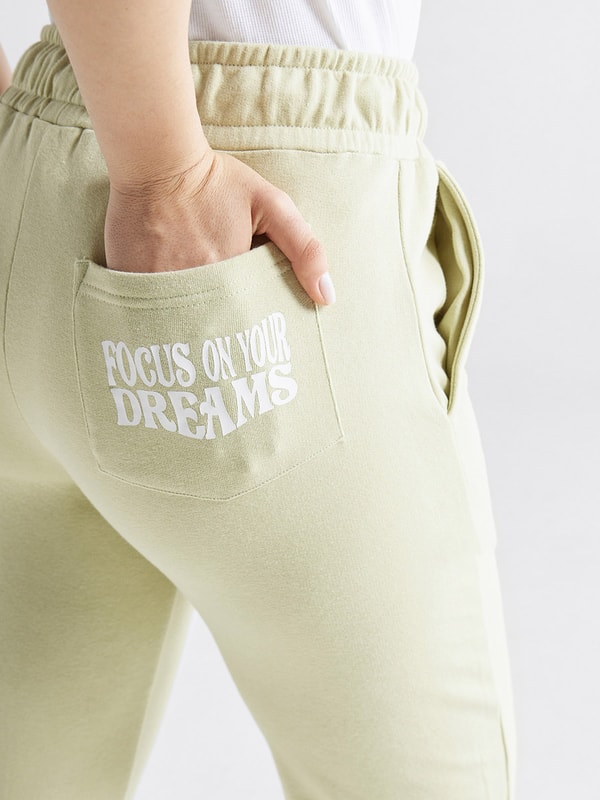 Back Pocket Slogan Print Track Pants For Women at Saudi | Styli