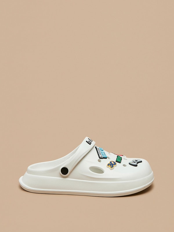 Buy Game Applique Detail Clogs White For Men | Styli Saudi