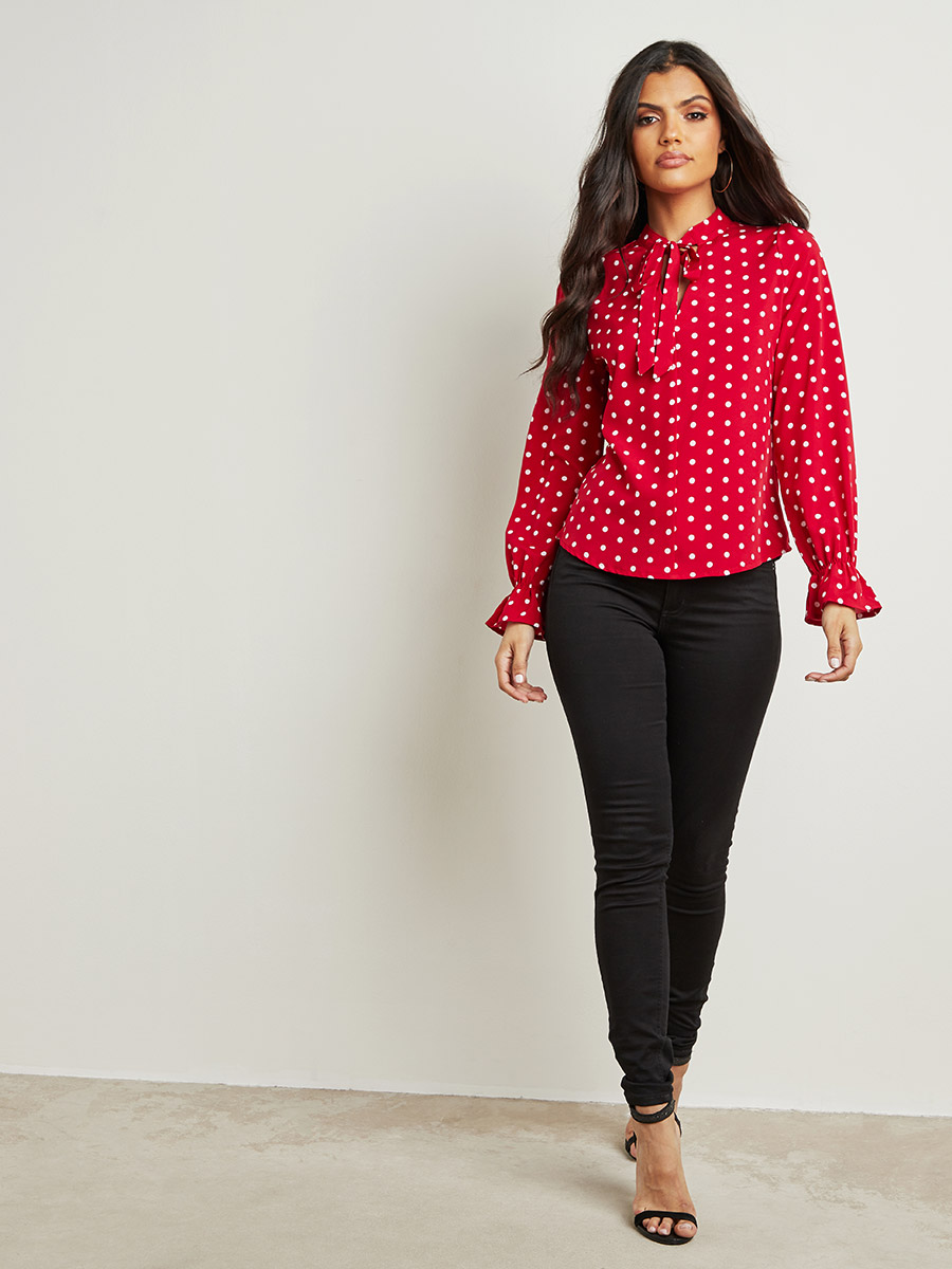 red and black polka dot blouse